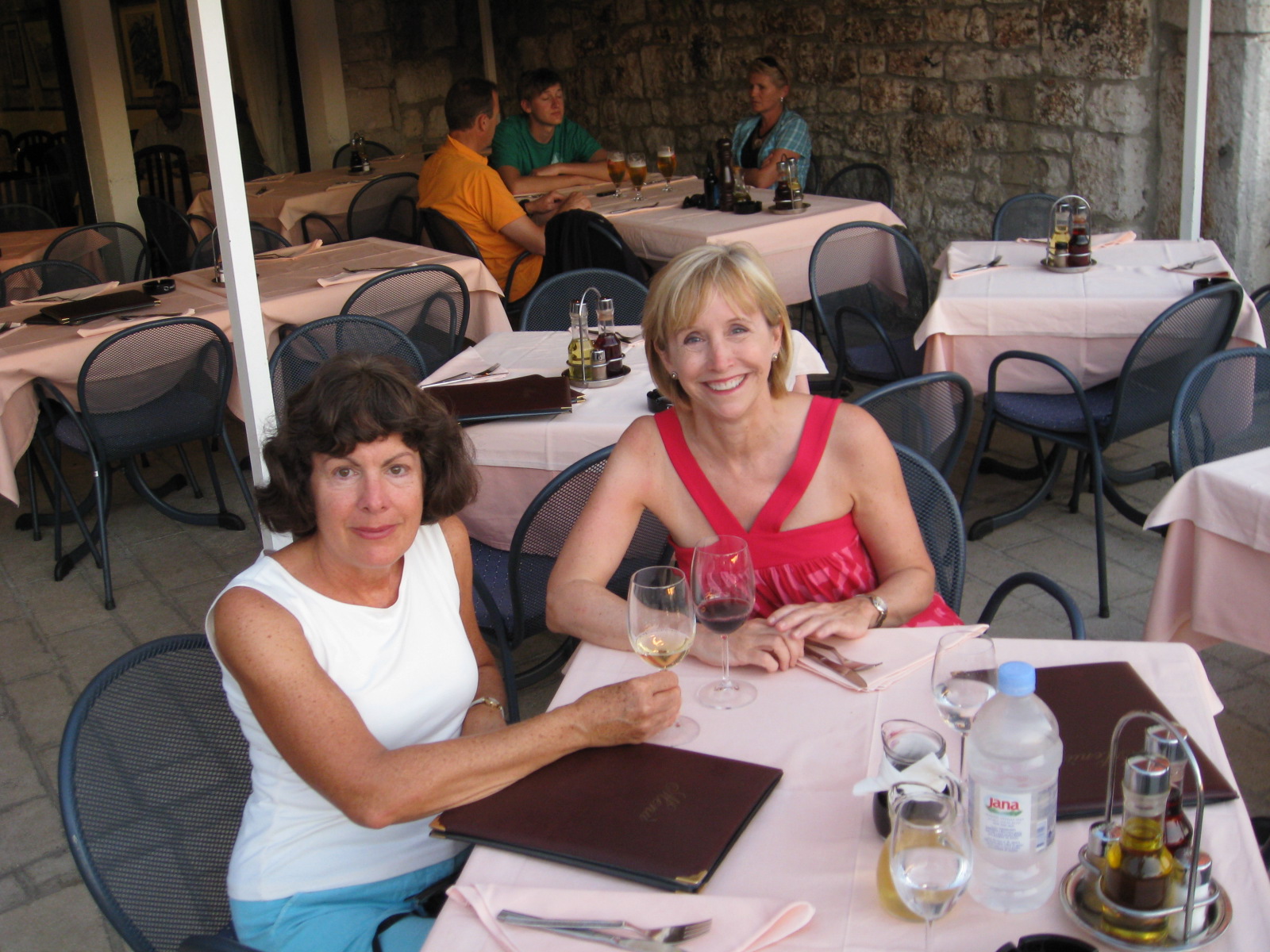 2 women eating outside in Rovinj, Croatia
