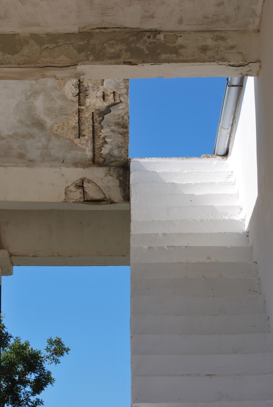 White stairs leading to blue sky